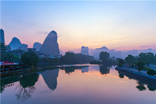 [Wind and waves and waves, and you are there. Yangshuo Dragon Ridge on the 5th] Four-star boat Lijiang River + Yinziyan + Yulong River bamboo raft + Yinziyan + Longji terraces + Yangshuo hot air balloons + Fuli Ancient Town Intangible Cultural Heritage Painting Fan Production